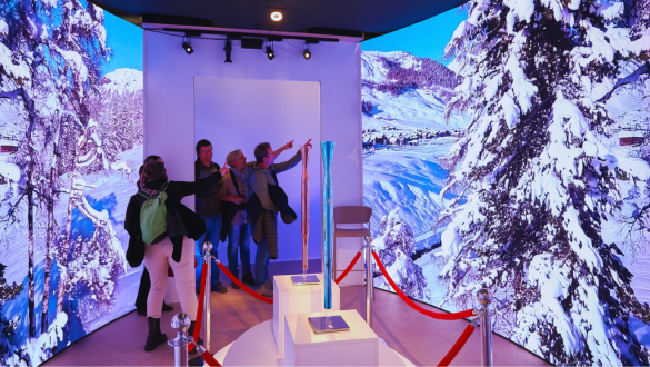 Vista delle torce olimpiche esposte presso lo stand di Artigiano in Fiera 2025.